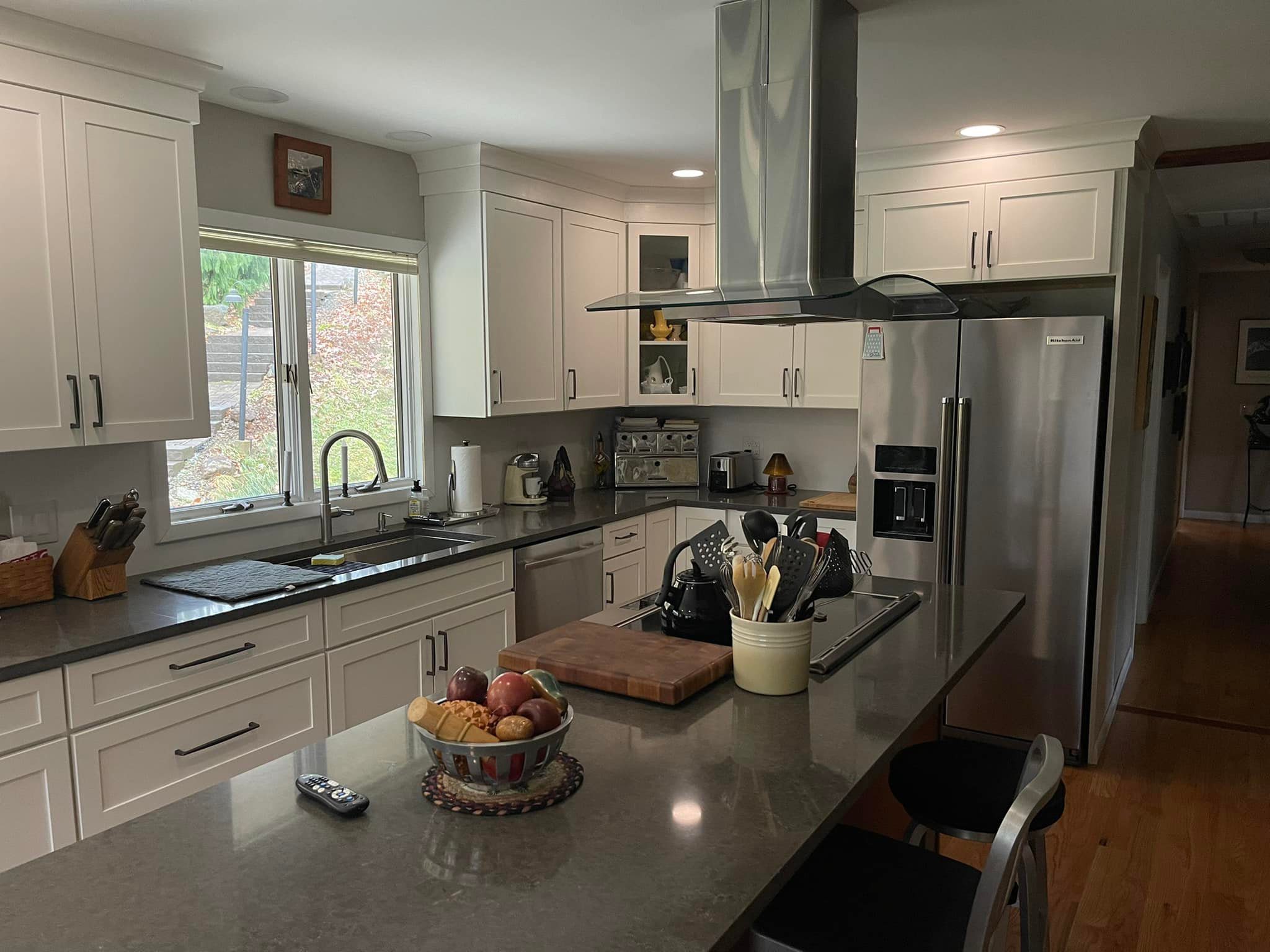 Connecticut kitchen remodel with white shaker cabinets, stainless steel appliances, and quartz countertops by Lagace Construction