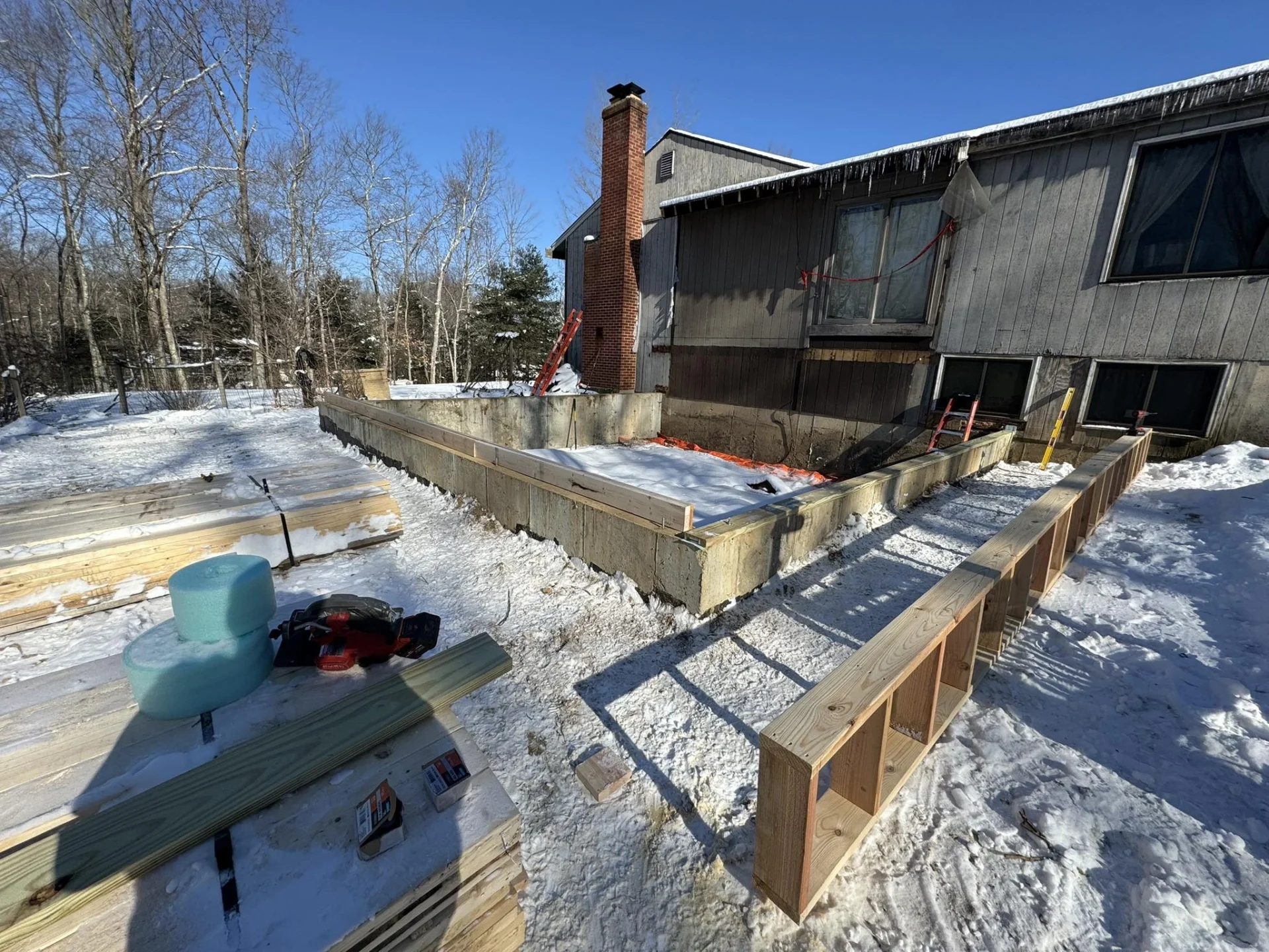 Beautiful finished living space addition in Coventry CT showcasing climate-resilient interior construction